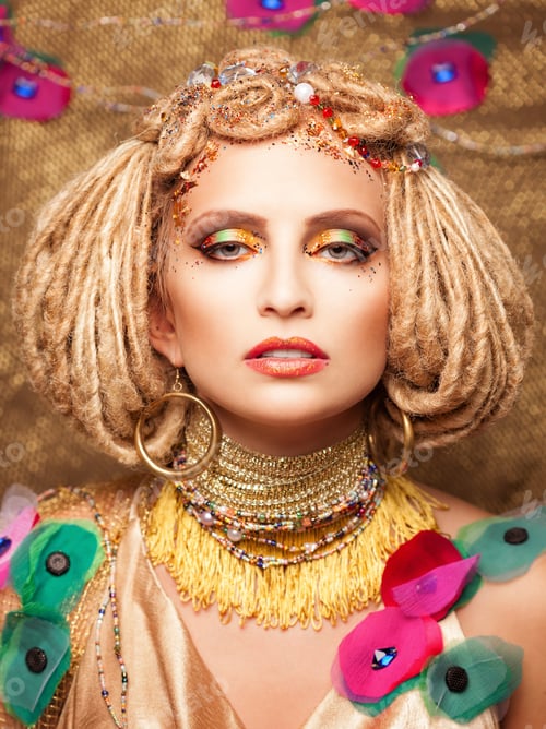Preview: young woman with fashion makeup on brown background