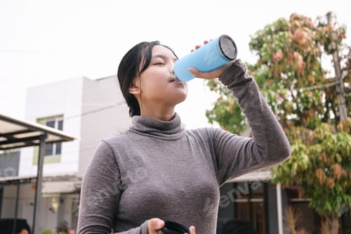 Preview: Woman Drinks Water