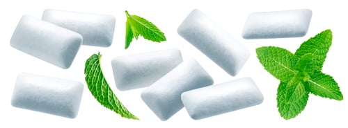 Preview: Chewing gum pads with mint leaves isolated on white background