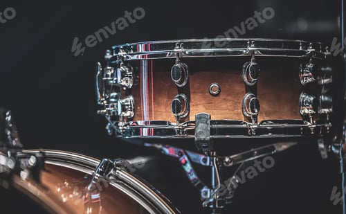 Preview: Close-up of a snare drum, part of a drum kit.