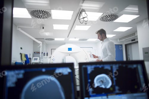 Preview: Radiologist at a x-ray machine in a hospital