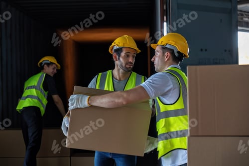 Preview: 3 Workers hand carry carton box take from 40 feet steel container one by one and stack on floor