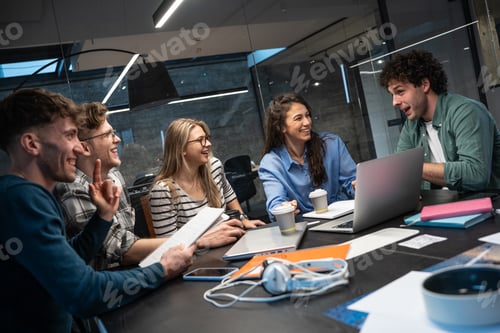 Preview: Programmers work alongside their colleagues in an office