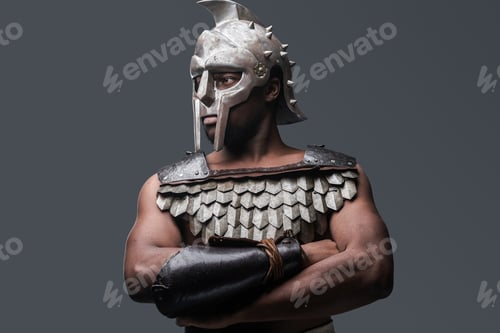 Preview: Proud gladiator wearing armor and helmet on gray background