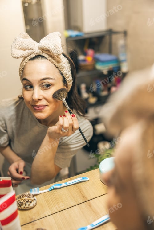 Preview: Reflection Of Woman Doing Makeup