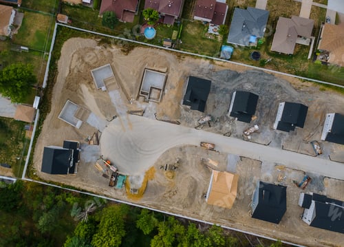 Preview: A residential aerial view of new housing development being built of a new home under construction
