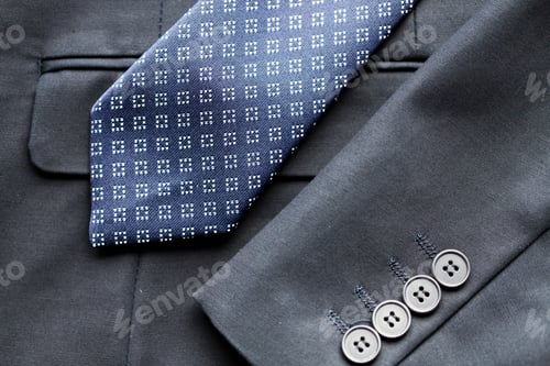 Preview: close up of business suit jacket and tie