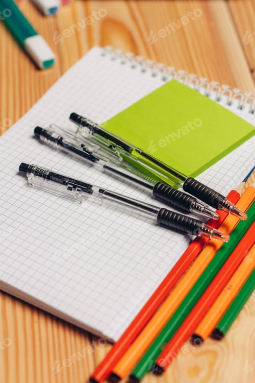 Preview: notepads pencils office work paper wood background