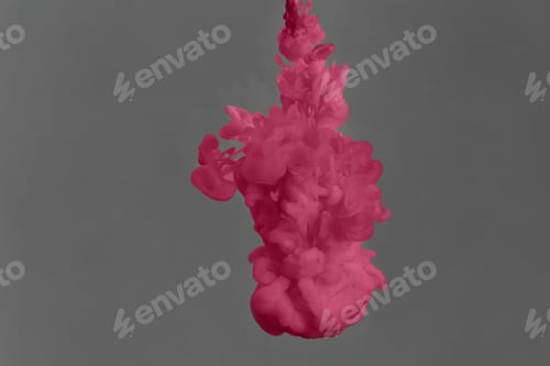 Preview: Splash of pink ink on grey background