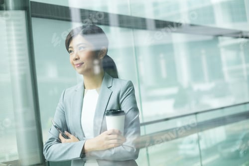 Preview: Business woman inside office