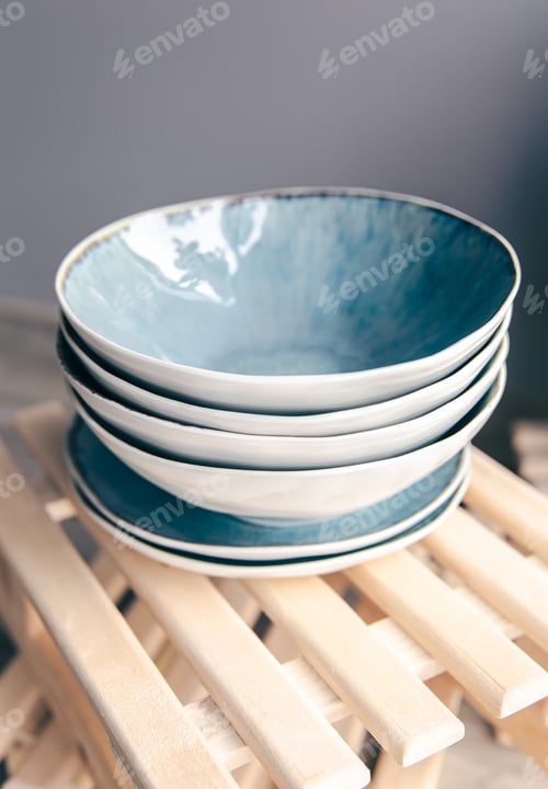 Preview: A set of beautiful plates in pastel colors on a gray background.