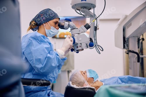 Preview: Mature woman undergoing an eye surgery at ophthalmology clinic.