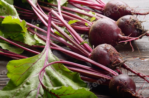 Preview: Fresh organic beetroots on kitchen wooden rustic table close up