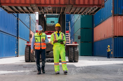 Preview: Industrial Engineer checking inventory or task details at Container cargo harbor. Logistics Expert O