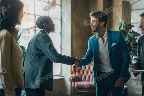 Preview: Diverse business team celebrating onboarding and leadership with professional handshake