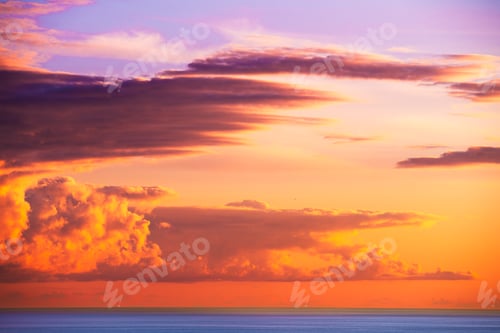 Preview: Golden Sunset Over the Sea with Vivid Pink and Orange Clouds