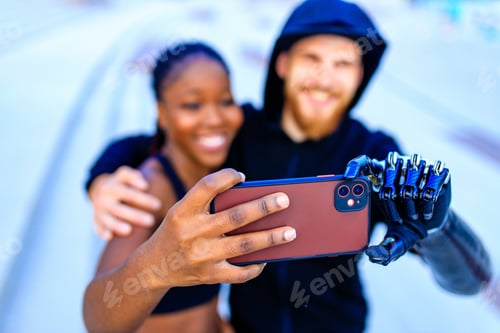 Preview: mixed race friends fitness training together outdoors taking selfie photo on smartphone camera