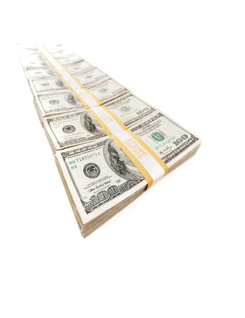 Preview: Row of Stacks of Hundred Dollar Bills Isolated on a White Background