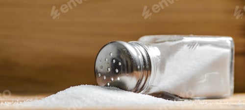 Preview: Salt background . On wooden table.