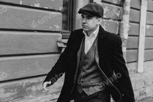 Preview: Portrait of a man in retro style. Peaky blinders. Vintage