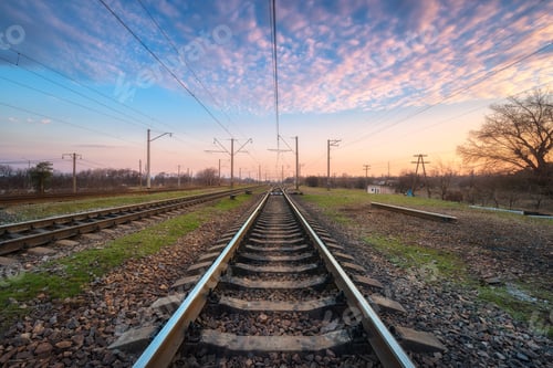 Preview: Railroad and beautiful sky at sunset. Railway