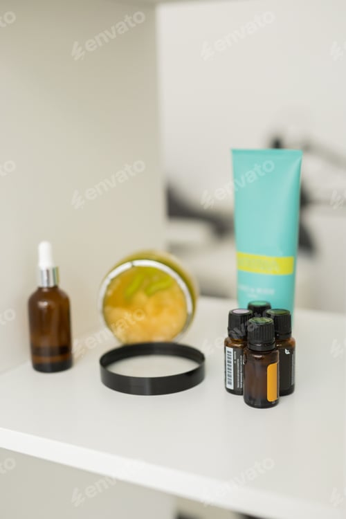 Preview: Close up of body care cosmetic products on shelf in cosmetology. Spa and piling cosmetics
