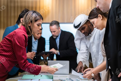 Preview: Group of multi-Ethnic businessman and businesswoman working in office.