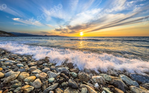 Preview: Waves breaking on pebble beach