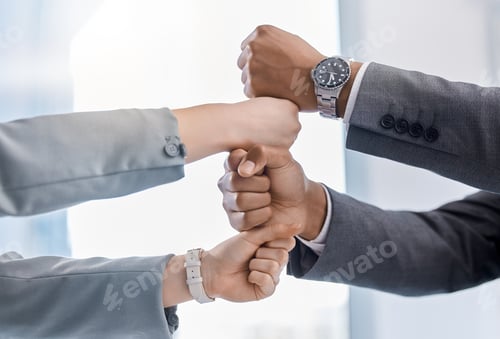 Preview: Teamwork, partnership and support handshake in business with man and woman fists together in office
