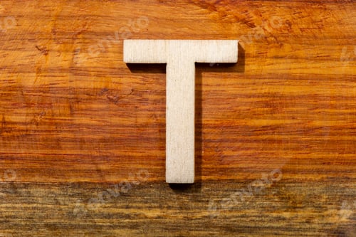 Preview: Wooden letters T on wooden background, top view