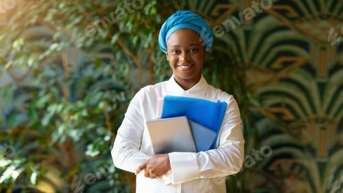 Preview: Pretty black lady posing at cafe, holding pad, notebook