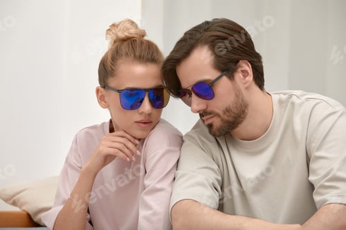 Preview: Close-up of an embracing couple in glasses, a man and a woman 25-35 years old are hugging on camera