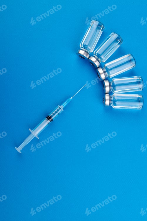 Preview: Medicine vials and syringe.