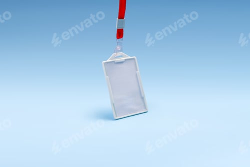Preview: Empty Name Badge Suspended In Air With Red Strap Casting Shadow On Light Blue Background