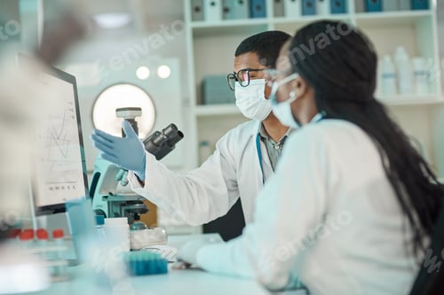 Preview: Gathering new data. Shot of two scientists working together on a computer in a lab.