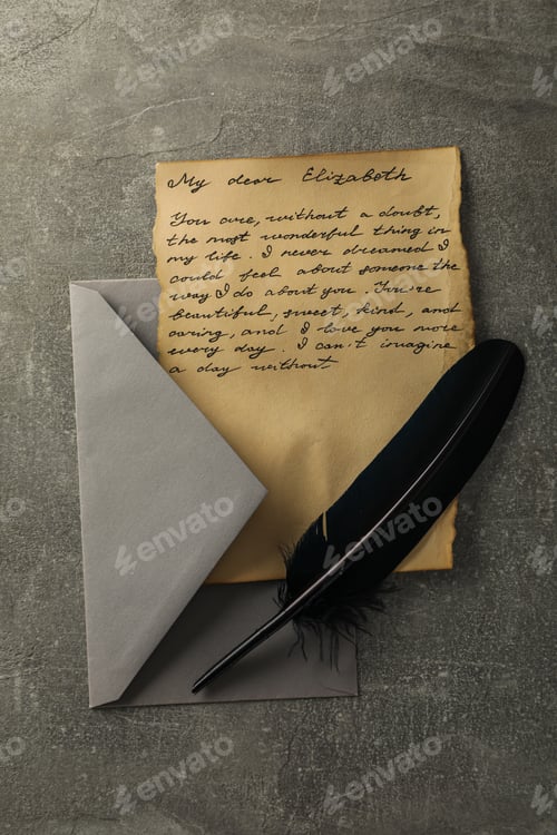 Preview: Letter with text, gray envelope and feather on gray background, top view