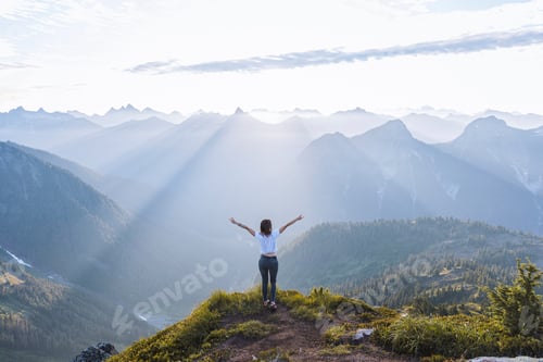 Preview: Embracing the wilderness atop a mountain at sunrise
