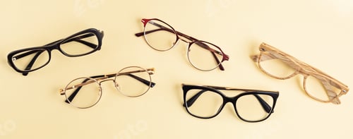 Preview: Banner with collection of eyeglasses over pastel background. Optical store, glasses selection, eye