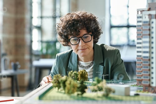 Preview: Designer working with construction mock-up