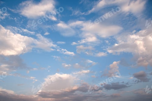 Preview: Blue sky with clouds and sun.