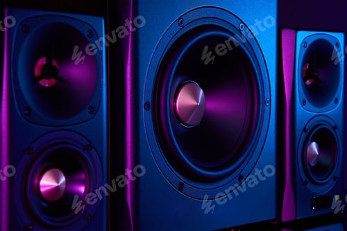 Preview: Two sound speakers and subwoofer on dark background with neon lights