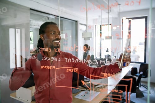 Preview: Business man making notes of information during workflow planning strategy for startup project