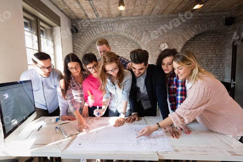 Preview: Picture of young architects discussing in office