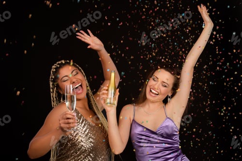 Preview: Portrait of two well dressed friends celebrating.