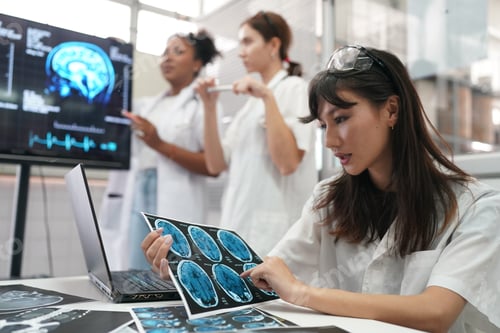 Preview: Group of doctors looking at X-ray on medical conference, discussing issues