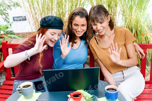 Preview: Three women having a video call on a laptop computer