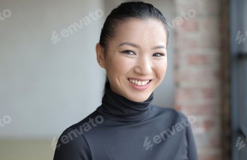 Preview: Attractive Asian female in a black outfit smiling gently