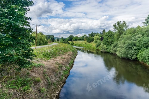Preview: Billowing Clouds Hang Over The Green River In Kent, Washington.