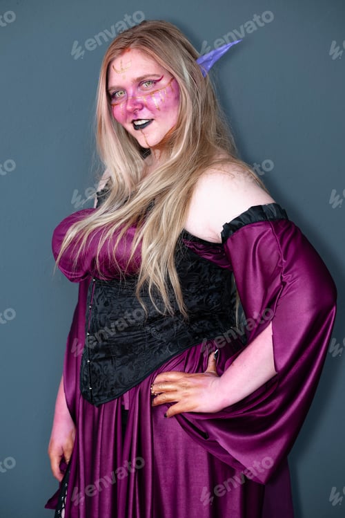 Preview: Female cosplayer in a fantasy witch costume