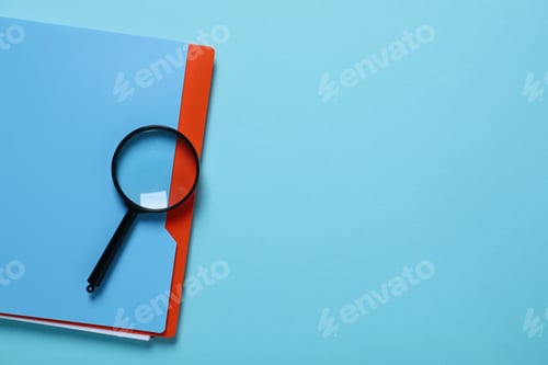 Preview: Magnifying glass and notepad on blue background, space for text